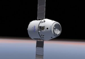 Artist concept of SpaceX's crewed Dragon spacecraft in orbit.