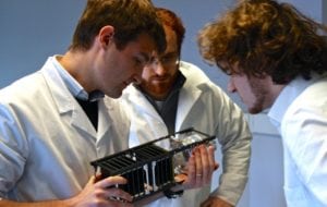 D-Orbit workers holding a cubesat. Photo: D-Orbit