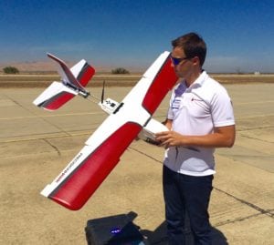 Tyler Collins, Vice President of Airspace Services - LATAS at PrecisionHawk, with the Lancaster drone.