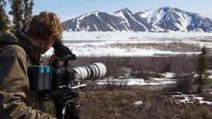 A filmmaker filming the BBC documentary Nature’s Epic Journey. Photo: BBC