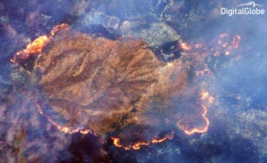 DigitalGlobe uses a Shortwave Infrared (SWIR) sensor built by Harris on its WorldView 3 satellite to penetrate the smoke and detect heat beneath. Photo: DigitalGlobe.