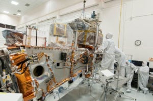 Ball and Raytheon technicians integrate the VIIRS Optical and Electrical Modules onto the JPSS 1 spacecraft. Credit: Ball Aerospace.