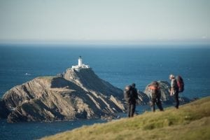 A lighthouse off the coast of Unst in the Shetlands. Photo: Shetlands.org.