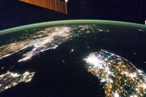 When observed from space at night, North Korea (the dark spot in the center) is difficult to distinguish. Photo: NASA.