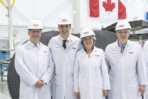 Canada Prime Minister Justin Trudeau joins MDA leaders to view the RADARSAT Constellation Mission satellites. Photo: Business Wire