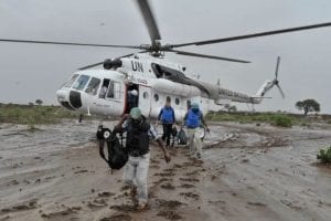 United Nations workers in Somalia disembark from an Mi-8MTV helicopter in November 2014. Photo: United Nations