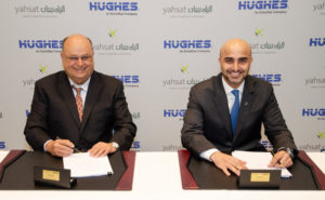 Pradman Kaul, President of Hughes, and Masood M. Sharif Mahmood, Yahsat’s Chief Executive Officer, make the companies’ new joint venture agreement official at SATELLITE 2019 in Washington, D.C. Photo: PRNewsfoto/Hughes Network Systems