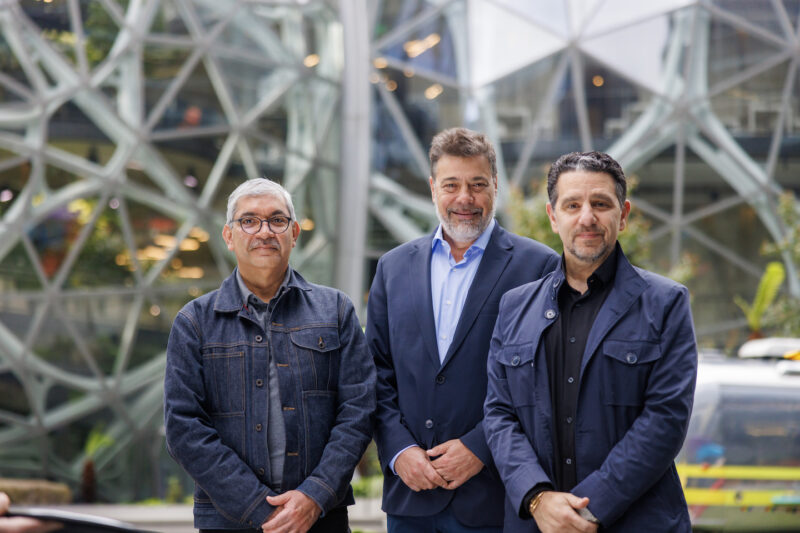 From left: Rajeev Badyal, vice president of Project Kuiper; Darío Werthein, president of Vrio Corp.; and Panos Panay, senior vice president of Amazon Devices & Services. Photo: Business Wire