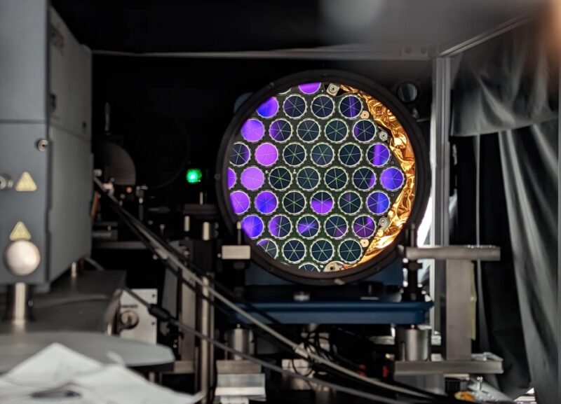 Reflection of the laser retroreflector array through the testing apparatus. Photo: NASA/Zach Denny