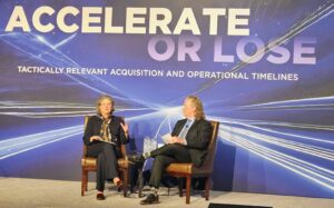 U.S. Space Force Chief Science Officer Stacie Williams, left, addresses the National Security Space Association Defense and Intelligence Space conference in Reston, Va., Feb 11, 2025, with moderator Jeff Gossel (right), former technical director for space and missiles at the National Air and Space Intelligence Center. Photo: Shaun Waterman for Via Satellite