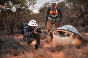 Varda Space Industries engineers recover the W-2 capsule after it landed in Australia after six weeks in orbit. Photo by William Godwin, Courtesy Varda Space Industries